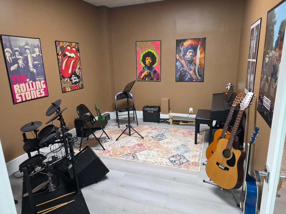 Classic Rock Music Lesson Room at Neighbour Note Toronto Classic rock-themed music lesson room with guitars and drums at Neighbour Note in Toronto